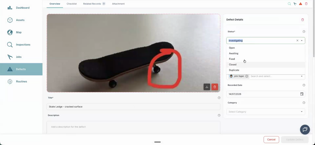 The defect status dropdown open on the web app