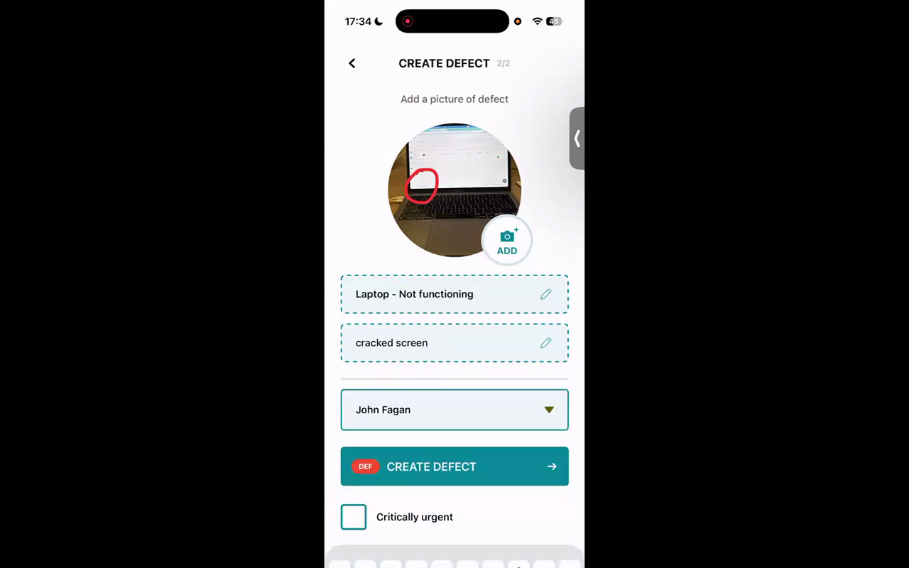 The Create Defect screen showing a photo with a red circle drawn on it and a description of cracked screen