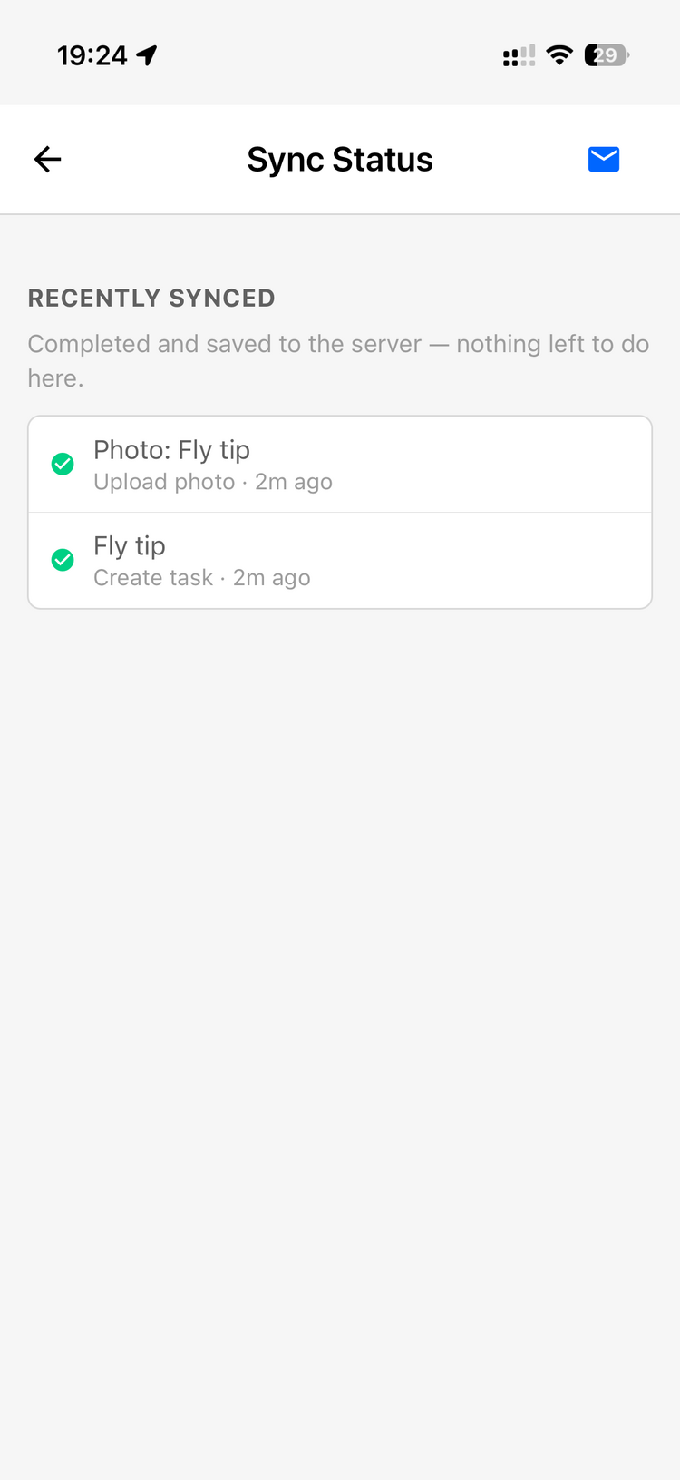 The Sync Status screen showing recently synced items with green ticks