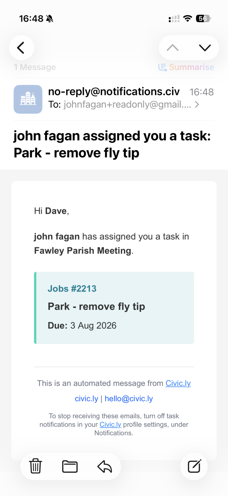 A task notification email open on a phone, subject line reading that john fagan assigned you a task, with a card showing the job number, title and due date, and a footer explaining how to turn task notifications off in profile settings