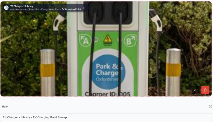 An inspection's photo with a chip in the top-left corner naming the asset, EV Charger - Library, and its classification underneath, Infrastructure and Amenities, Energy Amenities, EV Charging Point, with the Title field directly below the photo