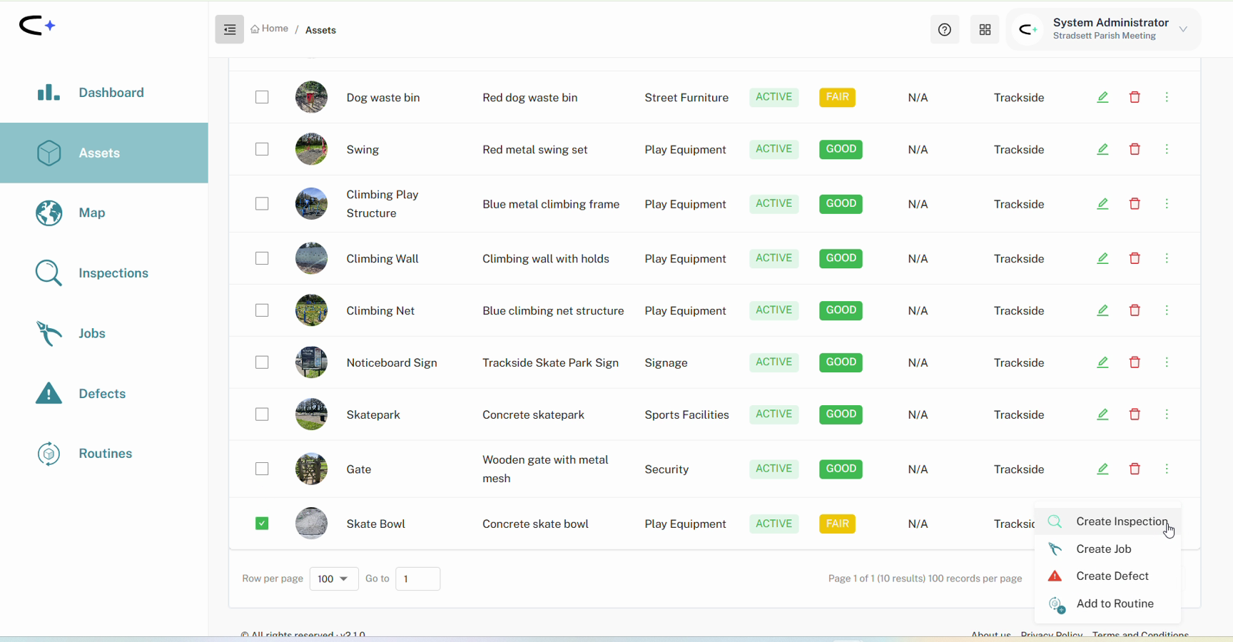 The asset register with the three-dot menu open on the Skate Bowl row, showing Create Inspection, Create Job, Create Defect and Add to Routine